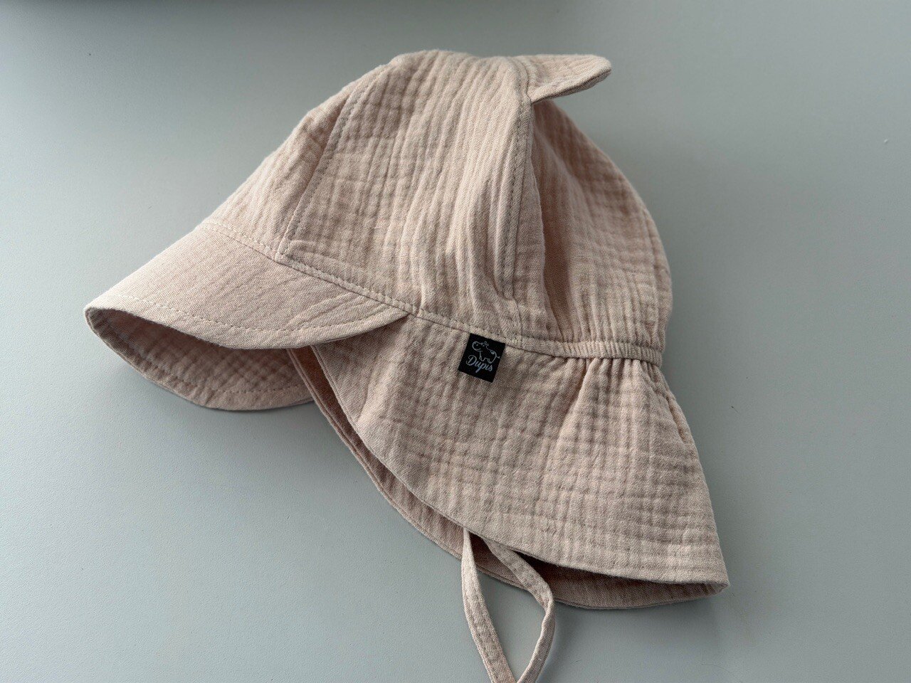 Vasaros muslino kepurė ,,Nude"