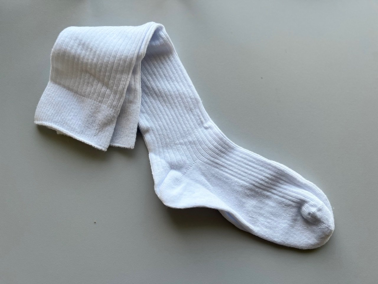 Ilgos baltos kojinės